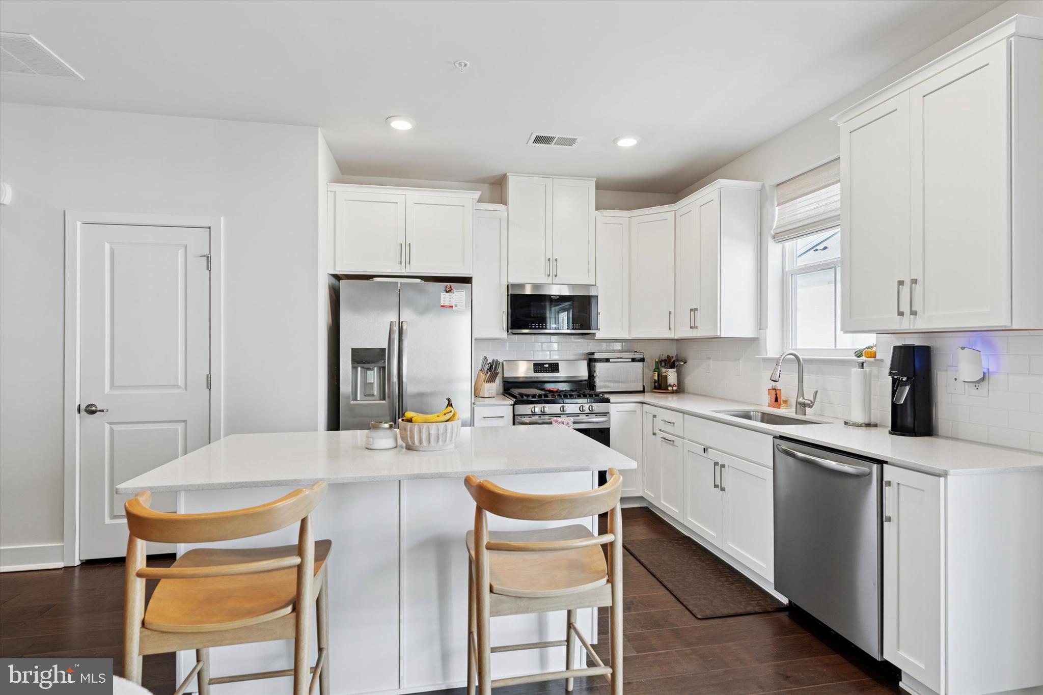 784 Ore Street Phoenixville, PA 19460 - Photo 6 of 30 a kitchen with stainless steel appliances kitchen island granite countertop a sink and cabinets