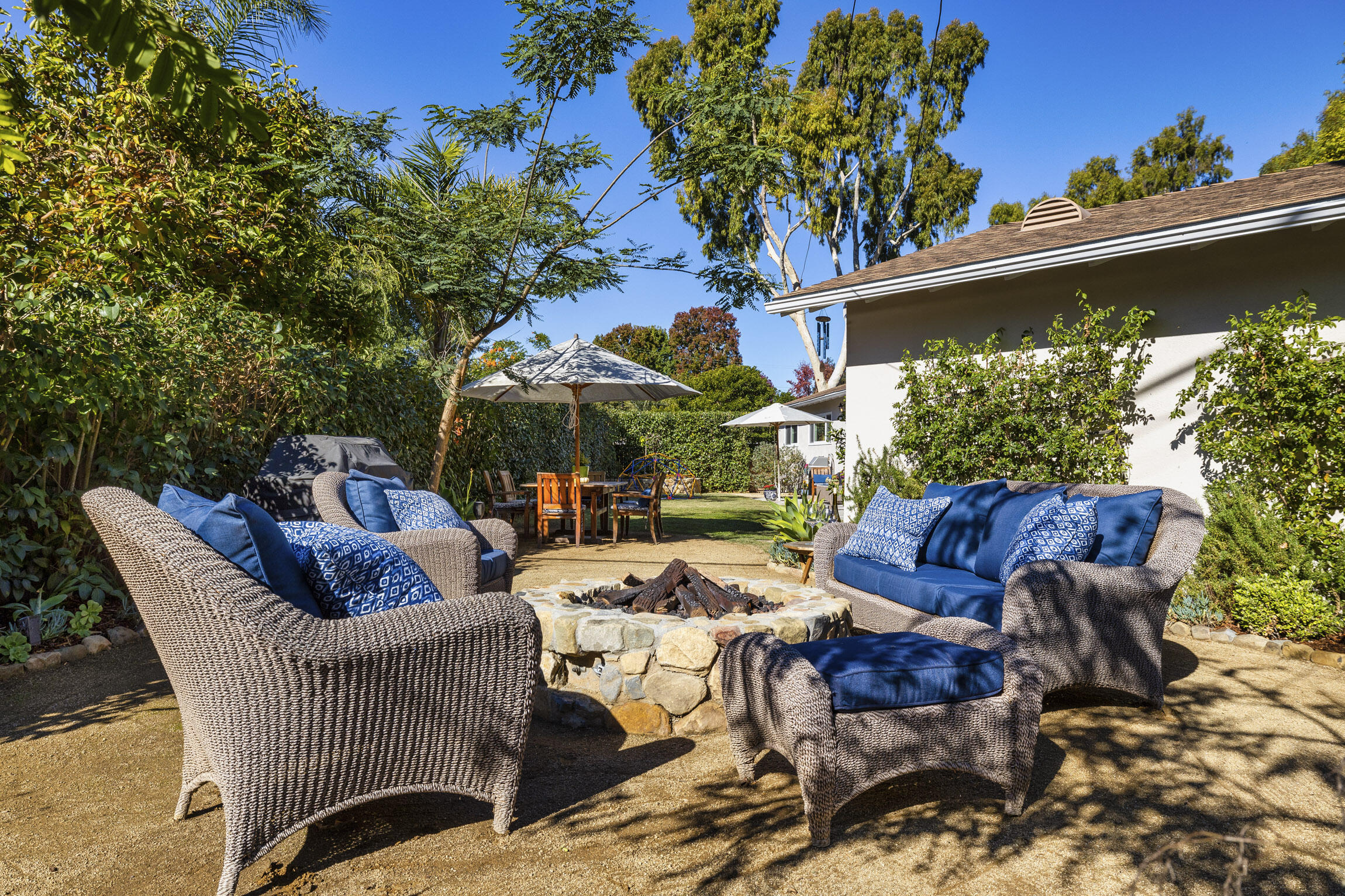 959 Barcelona Drive Santa Barbara, CA 93105 - Photo 11 of 24 a view of a patio with couches table and chairs and potted plants