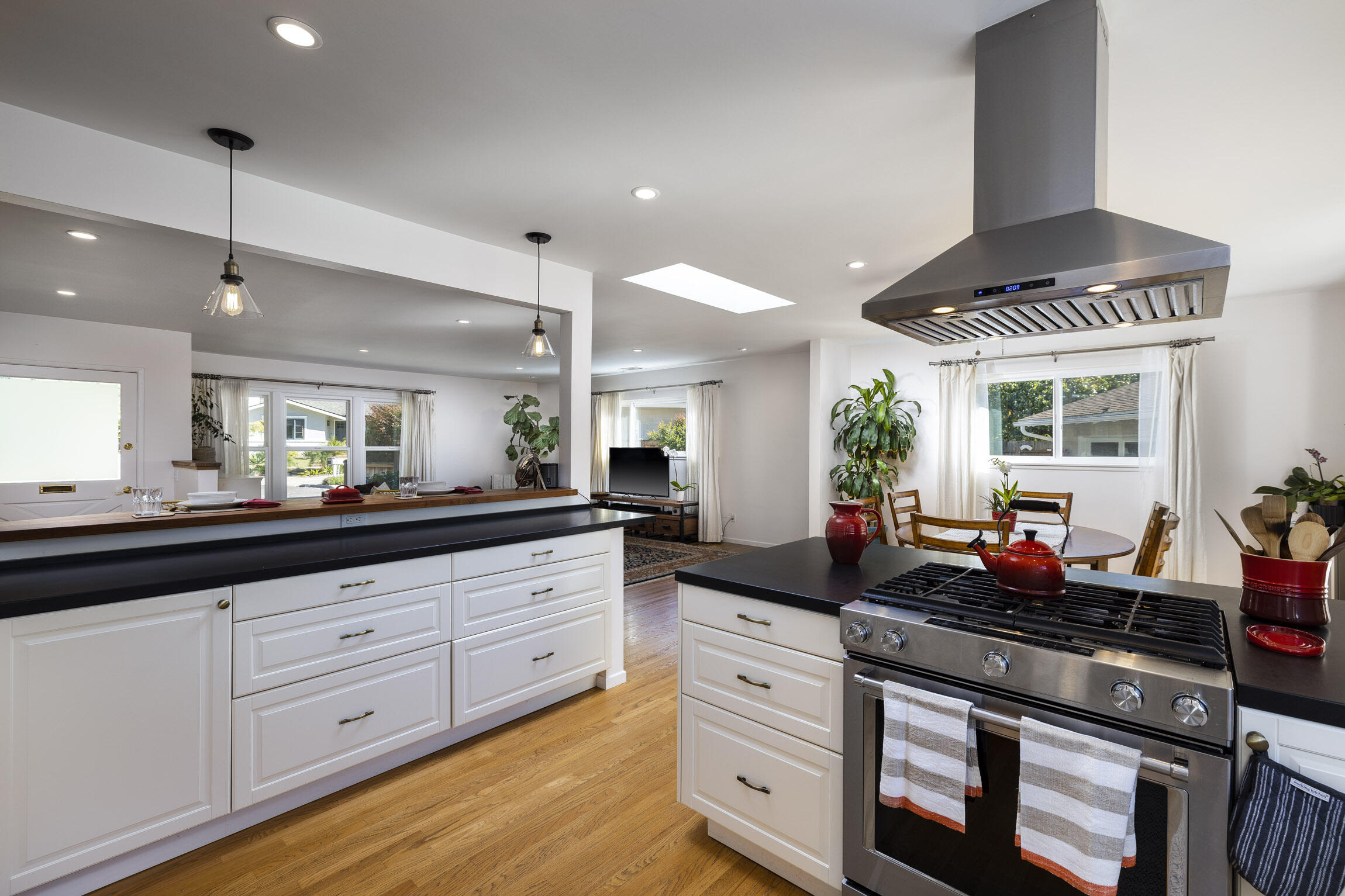 959 Barcelona Drive Santa Barbara, CA 93105 - Photo 17 of 24 a kitchen with granite countertop a sink stainless steel appliances and cabinets