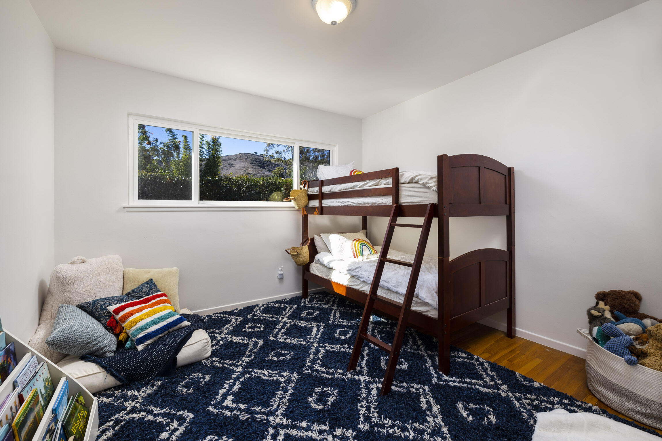 959 Barcelona Drive Santa Barbara, CA 93105 - Photo 22 of 24 a room with furniture and a window