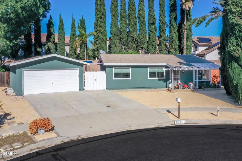 4895 Muirwood Court Simi Valley, CA 93063 - Photo 2 of 45 a front view of a house with a yard