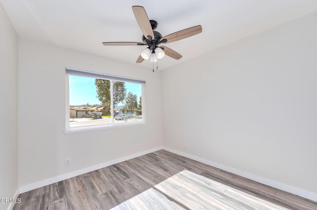 4895 Muirwood Court Simi Valley, CA 93063 - Photo 26 of 45 a wooden floor in a room next to a window