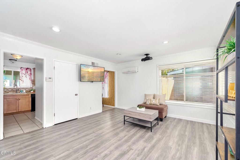 4895 Muirwood Court Simi Valley, CA 93063 - Photo 5 of 45 a living room with a bed furniture and a window
