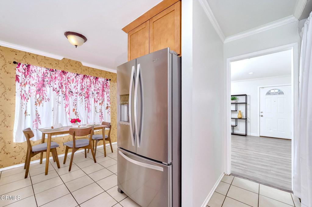 4895 Muirwood Court Simi Valley, CA 93063 - Photo 8 of 45 a kitchen with stainless steel appliances granite countertop a refrigerator and a refrigerator