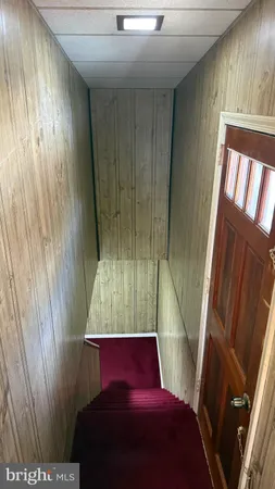 a bathroom with a sink and a large mirror