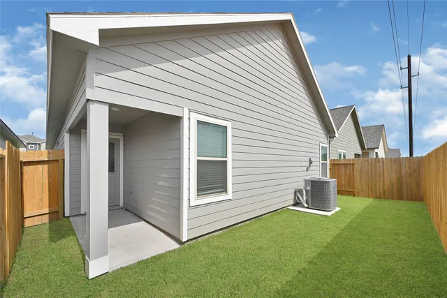 a view of a back yard of the house