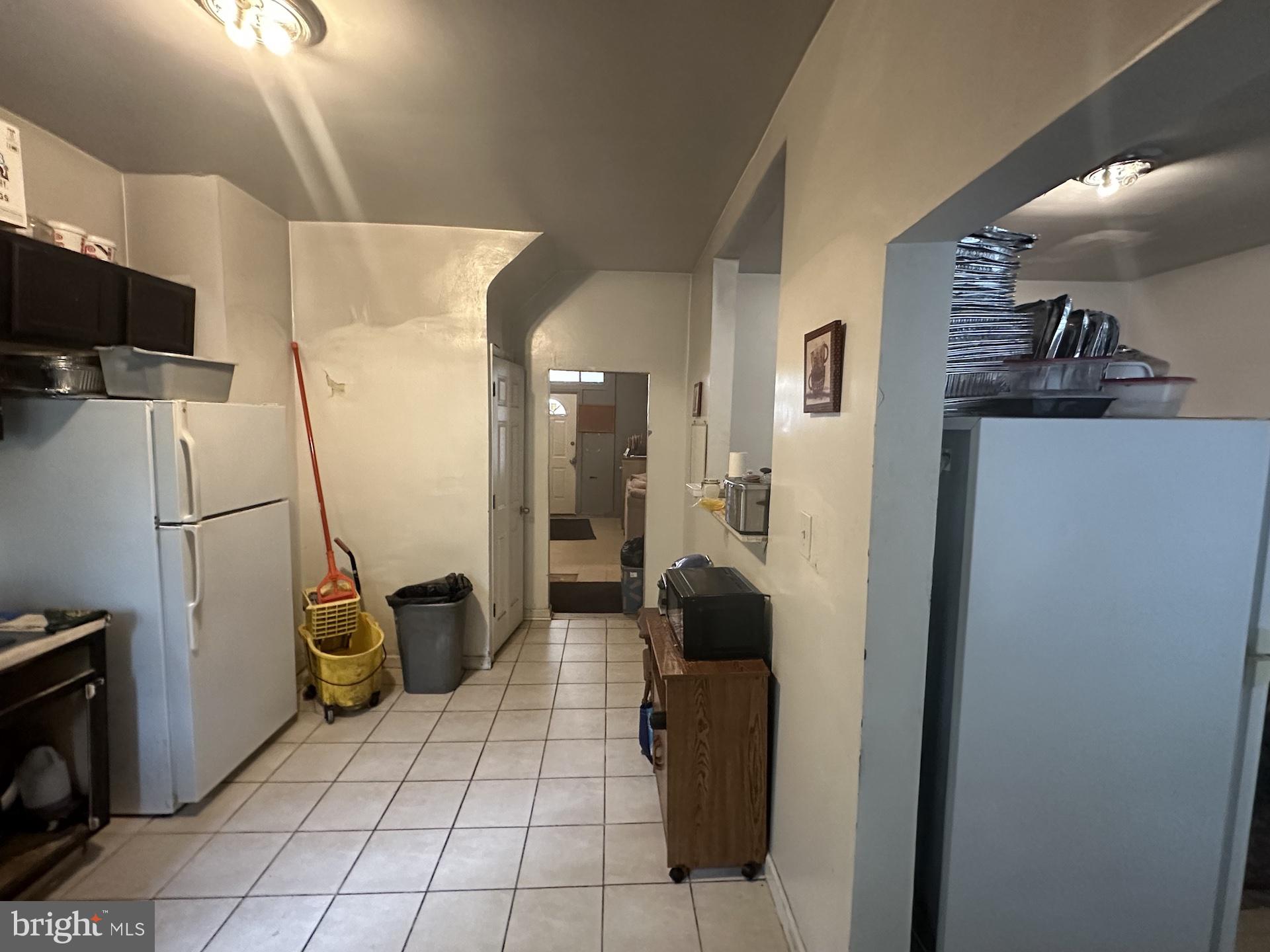 3926 Ridgewood Avenue Baltimore, MD 21215 - Photo 7 of 21 a view of a storage and utility room