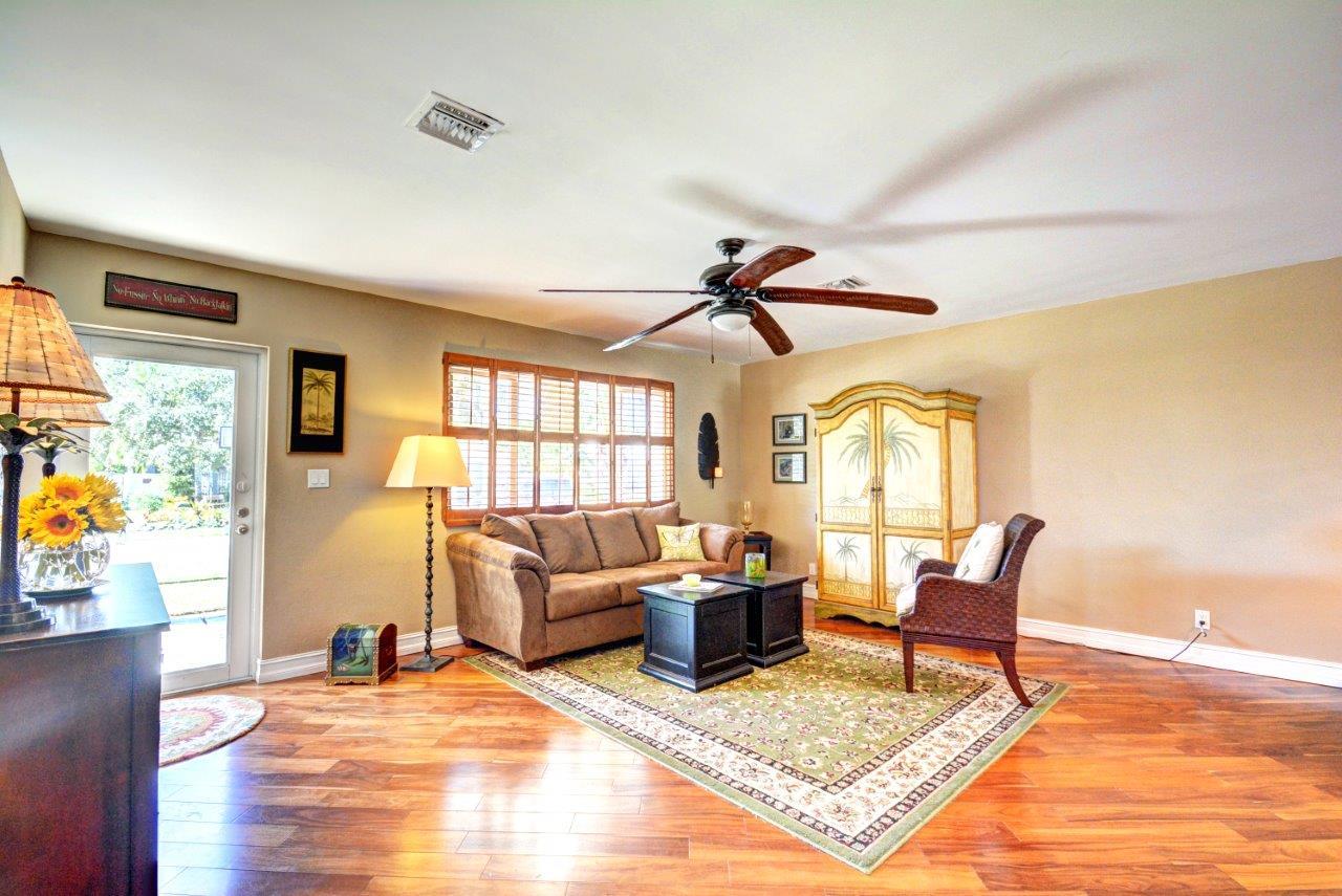 1135 Southwest 14th Street Boca Raton, FL 33486 - Photo 2 of 26 a living room with furniture and a rug