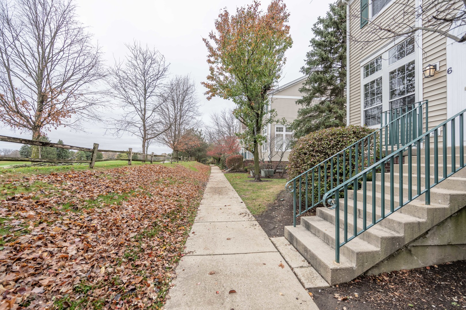 2430 Courtyard Circle, Unit 6 Aurora, IL 60506 - Photo 26 of 28 a view of yard with large trees