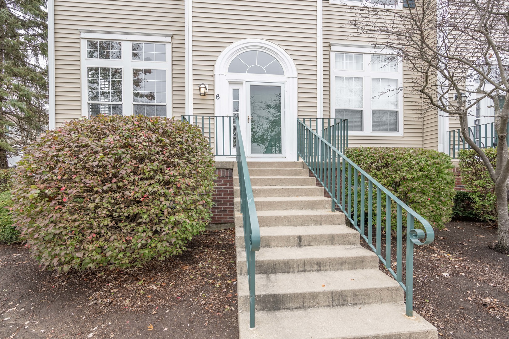 2430 Courtyard Circle, Unit 6 Aurora, IL 60506 - Photo 3 of 28 a view of a house with a porch