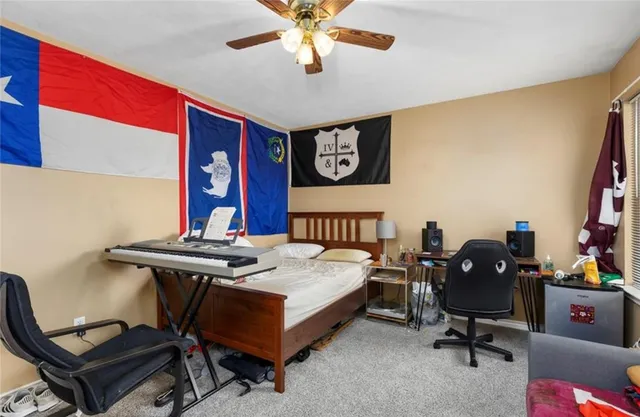 a view of a workspace with furniture