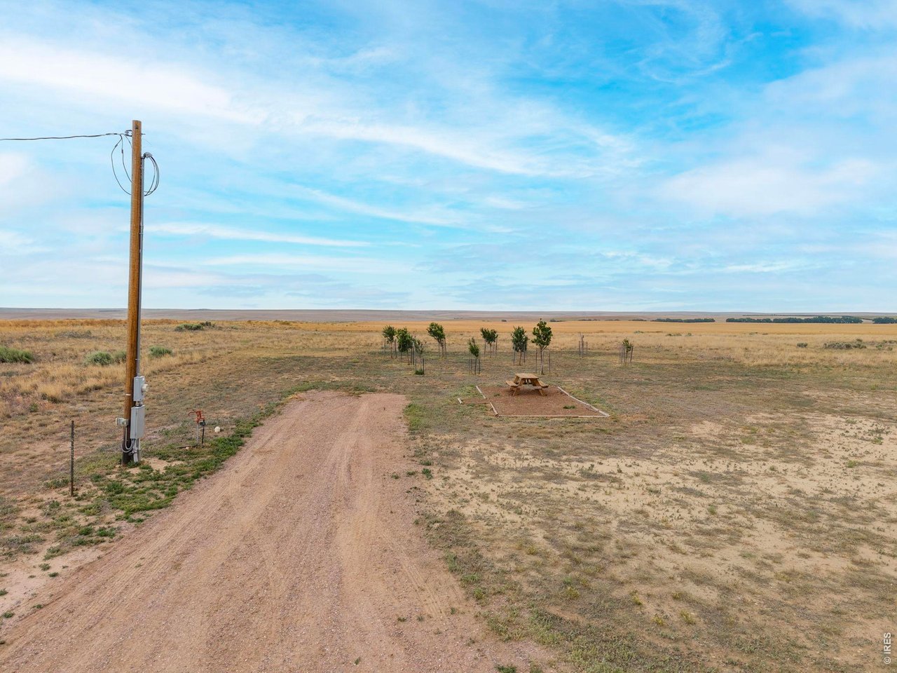 13550 Deter-Winters Road Byers, CO 80103 - Photo 9 of 50 The straight road base drive leading to the barn makes connecting and disconnecting tow vehicles easy whenever needed