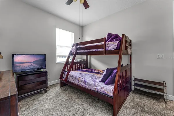 a bathroom with a double vanity sink and mirror
