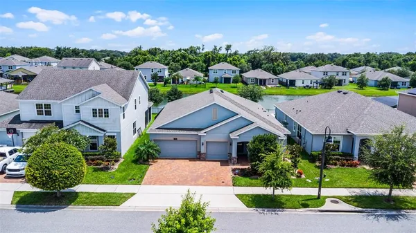 an aerial view of a city and mountain