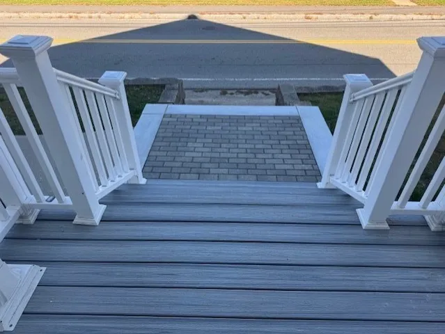 a view of staircase with wooden floor and stairs
