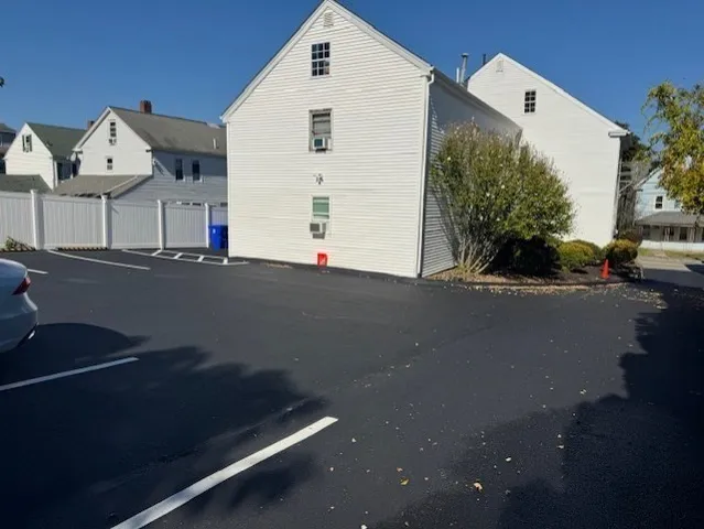 a view of street with parked cars