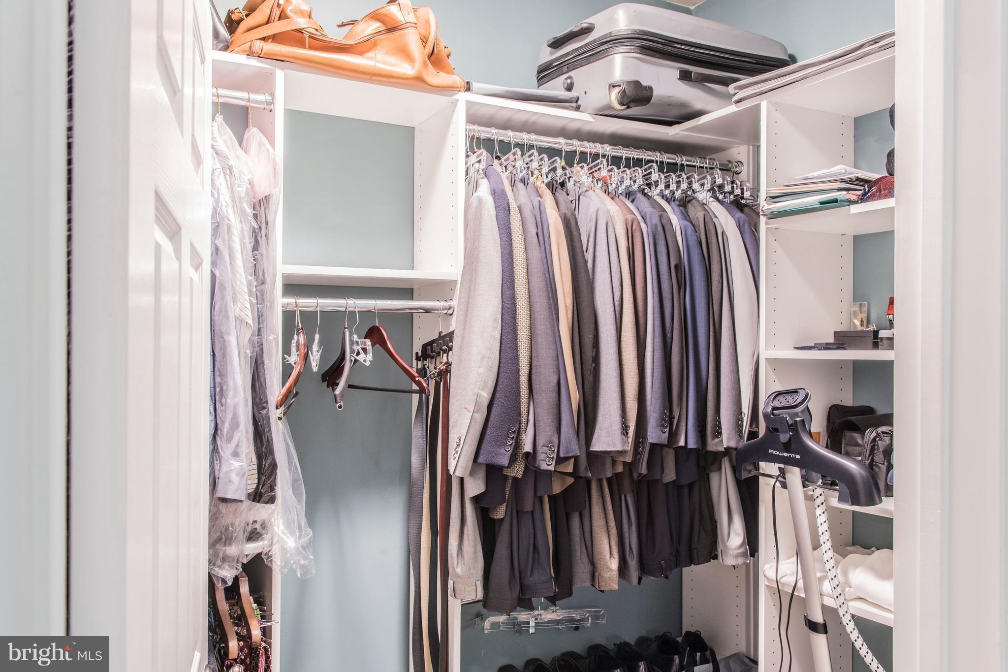 504 Sunset View Terrace Southeast, Unit 206 Leesburg, VA 20175 - Photo 11 of 18 a view of walk in closet with clothes and shoes