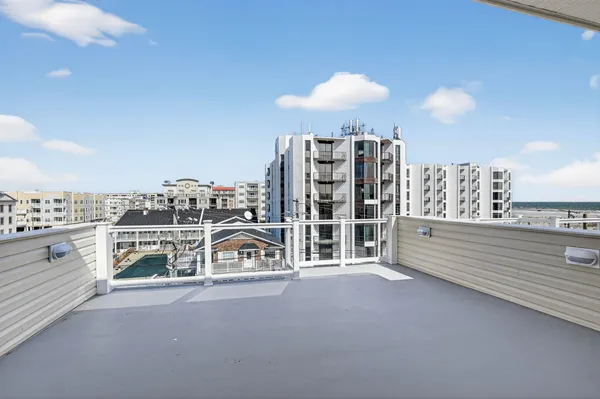 a view of a balcony with an outdoor space