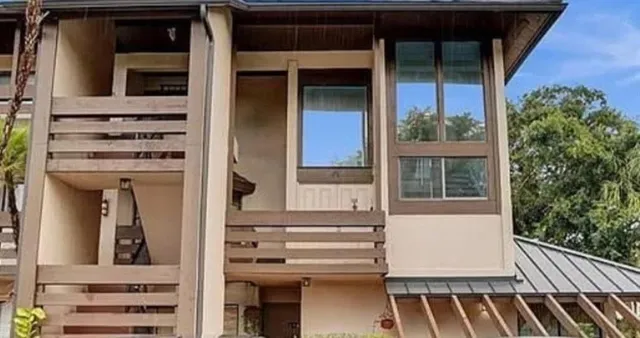 a view of front door and bedroom