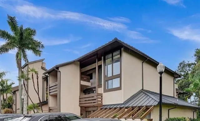 a view of a house with a roof deck