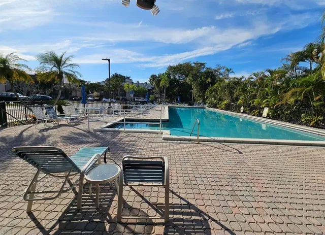 a view of house with outdoor seating space