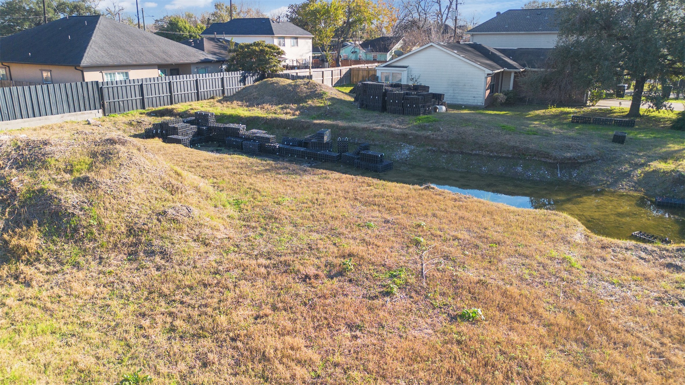 6019 England Street Houston, TX 77021 - Photo 12 of 21 a view of backyard with wooden fence