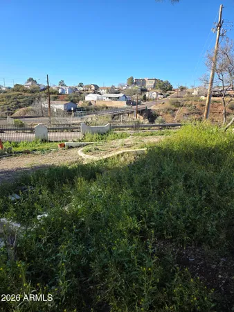 a view of backyard with seating space