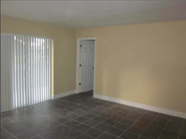 en empty room with windows