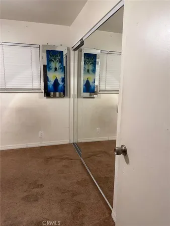 a bathroom with a sink a vanity and mirror