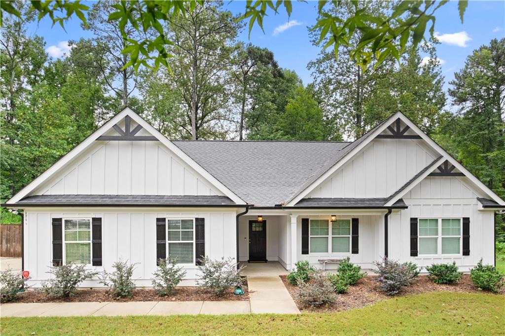 2795 Pilgrim Mill Road Cumming, GA 30041 - Photo 1 of 1 front view of a house and a yard
