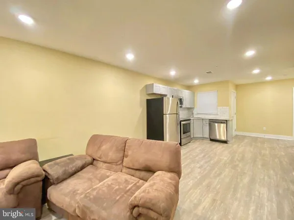 a living room with a couch and a couch