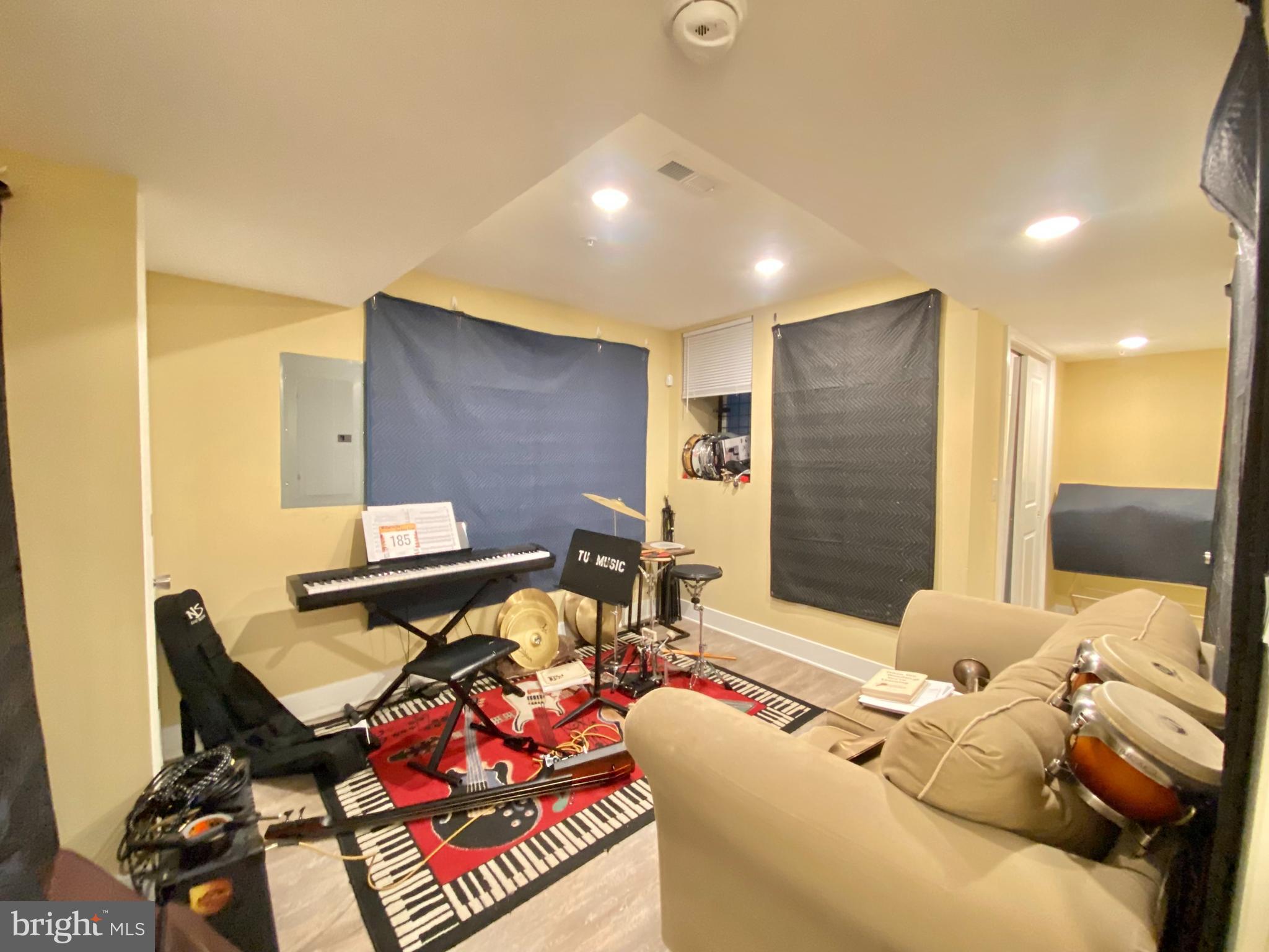 2214 North Camac Street, Unit A Philadelphia, PA 19133 - Photo 10 of 18 a living room with furniture