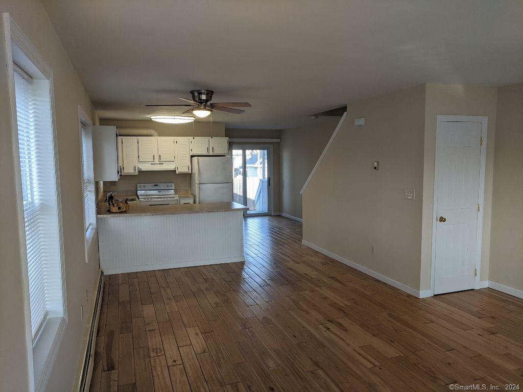 42 Ferris Street Bridgeport, CT 06605 - Photo 5 of 16 View to Kitchen and Slider to Deck