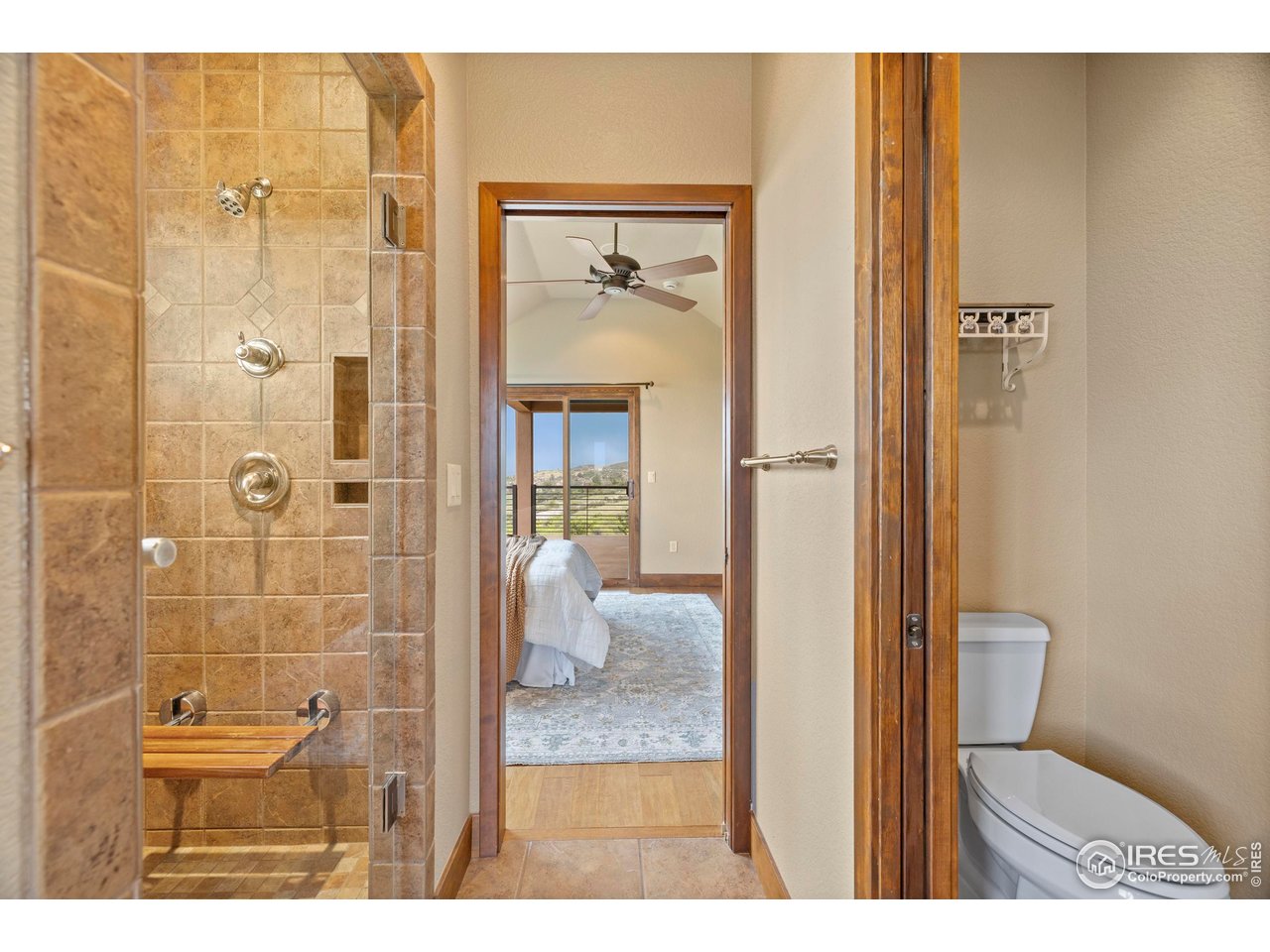 183 Red Bear Road Laporte, CO 80535 - Photo 25 of 32 a bathroom with a toilet and a shower