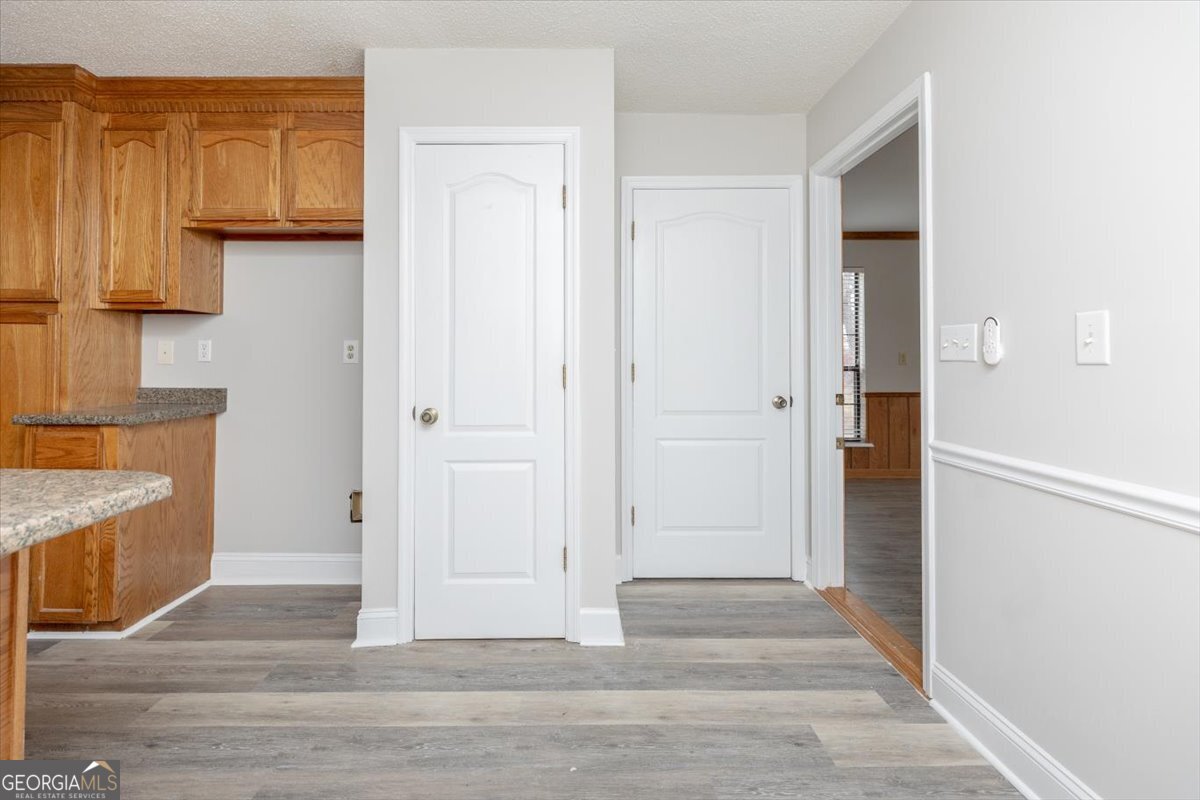 1027 Kathryn Ryals Road Warner Robins, GA 31088 - Photo 23 of 54 a view of a kitchen from the hallway