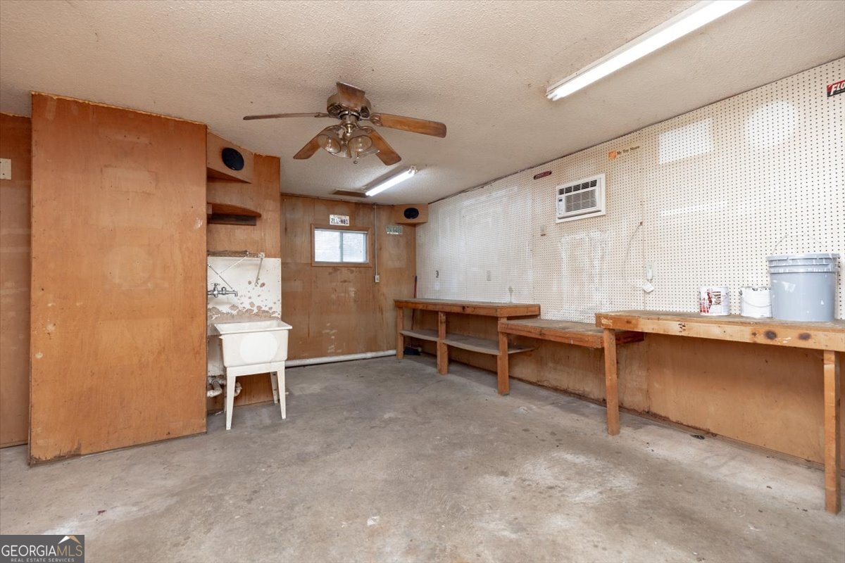 1027 Kathryn Ryals Road Warner Robins, GA 31088 - Photo 43 of 54 a view of a livingroom with furniture and a window