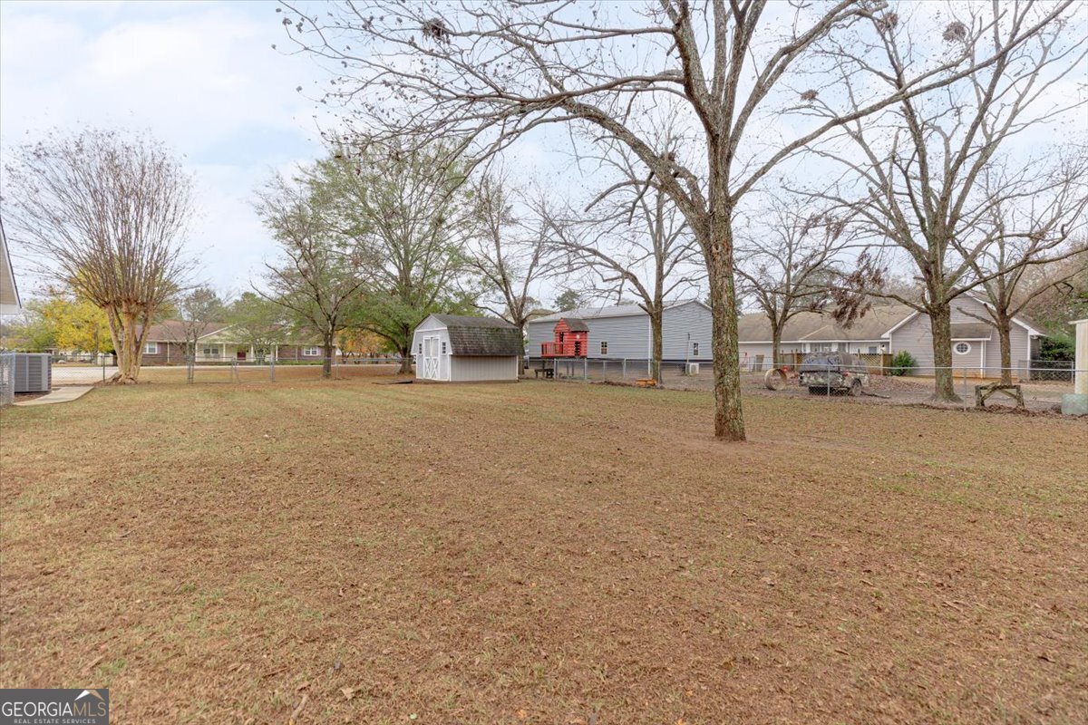 1027 Kathryn Ryals Road Warner Robins, GA 31088 - Photo 53 of 54 a view of road with snow on the roadside