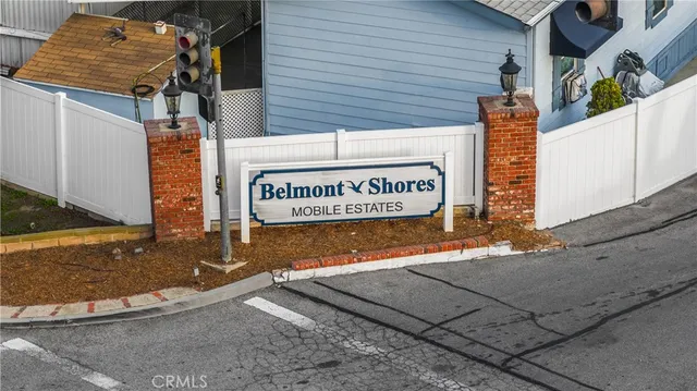 a sign on a pole on a street