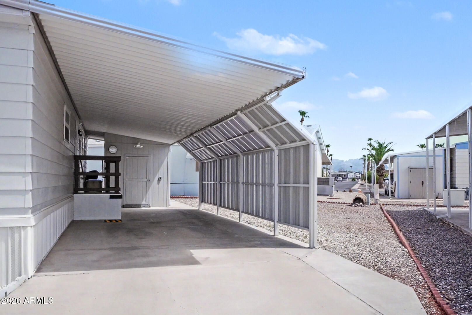 301 South Signal Butte Road, Unit 74 Apache Junction, AZ 85120 - Photo 25 of 31 Extended Carport