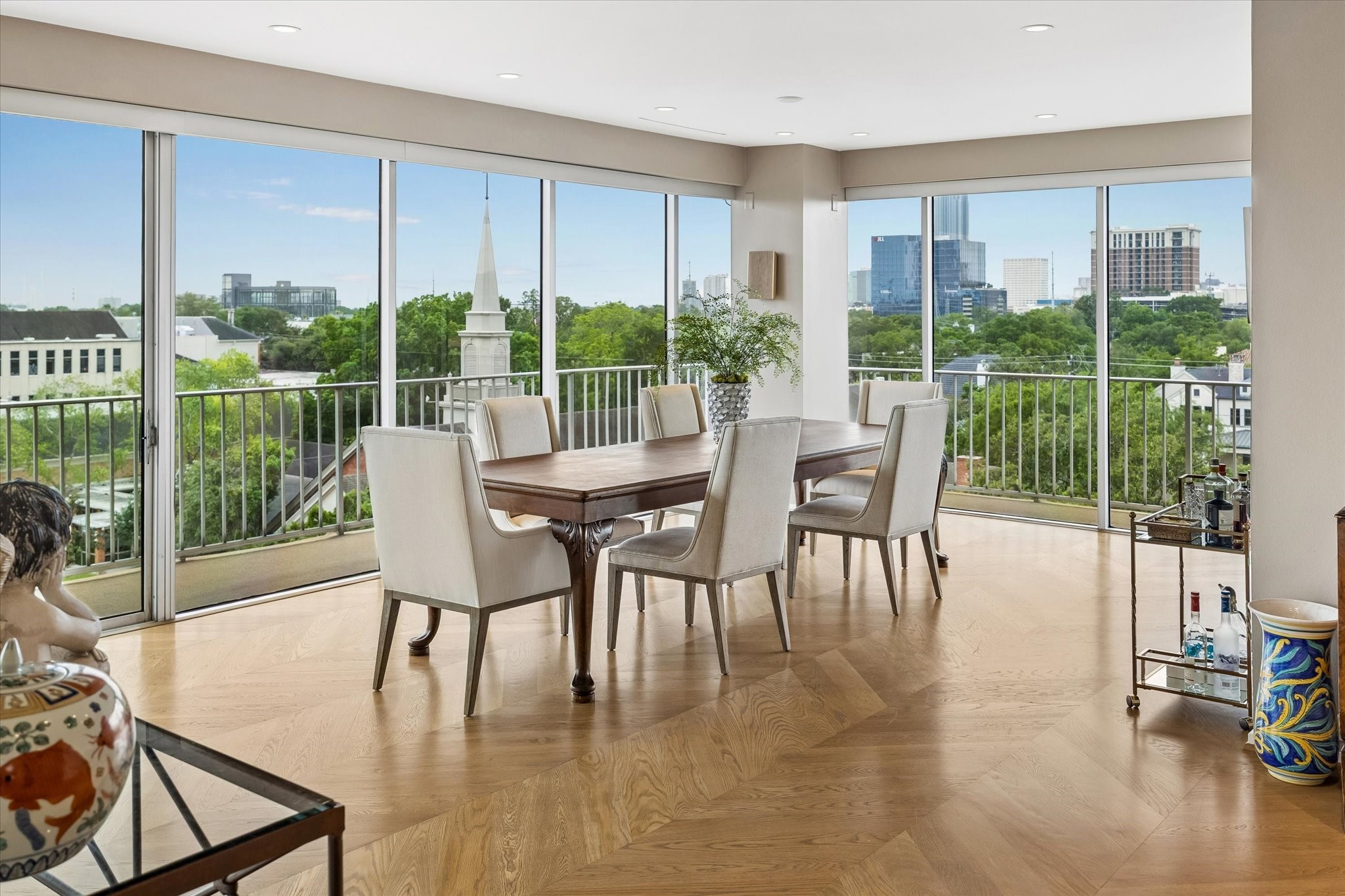 2200 Willowick Road, Unit 5C Houston, TX 77027 - Photo 6 of 27 Dining Room with south and west views. Electric solar shades on all windows.
