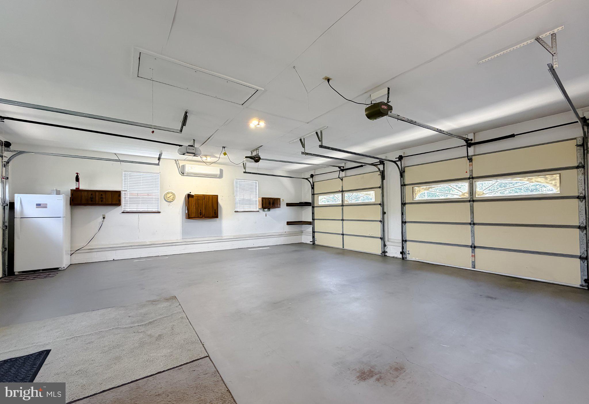 23230 Colton Point Road Avenue, MD 20609 - Photo 53 of 63 Spacious garage with ample storage.
