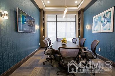 4304 Pine Valley Way Piscataway, NJ 08854 - Photo 14 of 26 a view of a dining room with furniture a chandelier and wooden floor