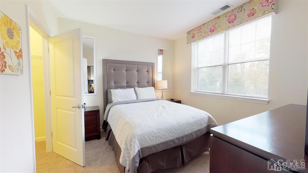 4304 Pine Valley Way Piscataway, NJ 08854 - Photo 21 of 26 a bedroom with a bed and a window