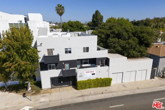a view of a livingroom with furniture and a fireplace