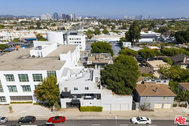 a aerial view of a house with outdoor seating