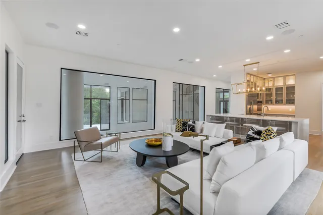 a living room with furniture and a table