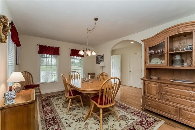 80 Brookside Road, Unit 205 Bourne, MA 02532 - Photo 12 of 35 a dining room with furniture and window