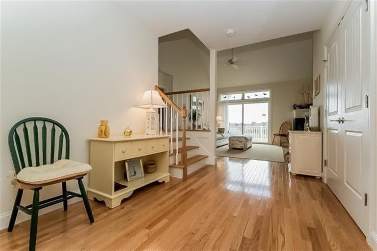 80 Brookside Road, Unit 205 Bourne, MA 02532 - Photo 8 of 35 a living room with furniture and a fireplace