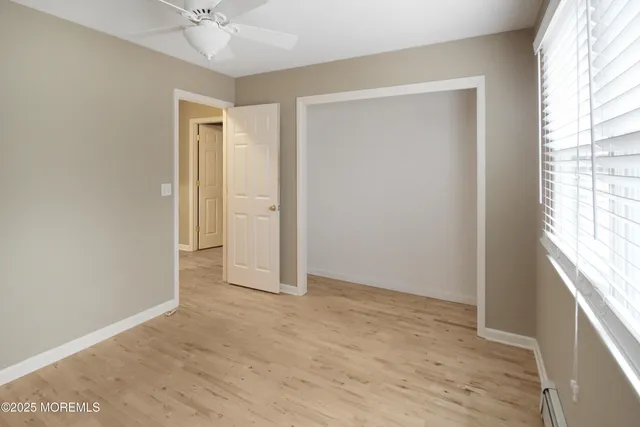 a view of a house with a small yard