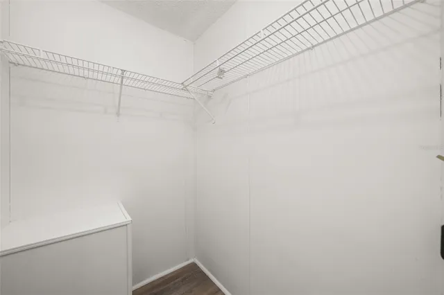 a view of a room with racks on the wall